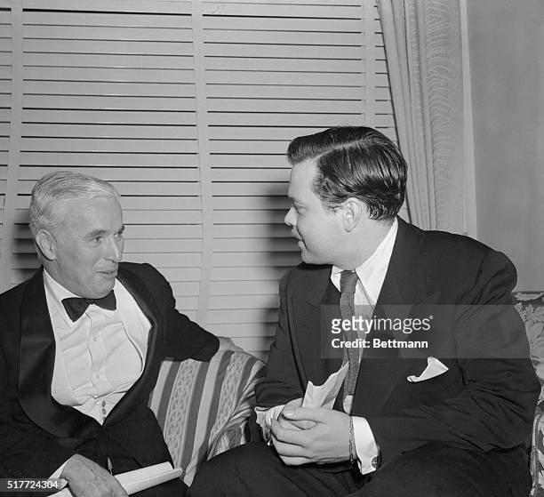 Orson Welles , famed actor-writer-director, talks to Charles Chaplin at the Carnegie Hall "Artists Front to Win the War," where artists from all...
