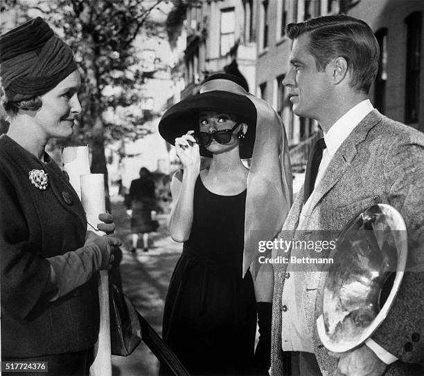 Left to right: Patricia Neal, Audrey Hepburn and George Peppard in a scene from the movie: Breakfast at Tiffany's 1961.