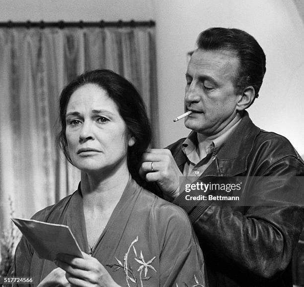 Academy Award nominee George C. Scott consoles actress Colleen Dewhurst, who portrays a friendly prostitute in this scene from the forthcoming MGM...