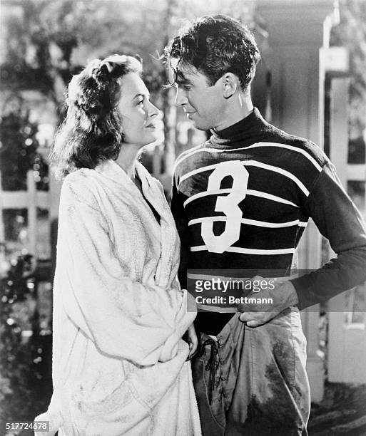 Donna Reed & James Stewart are shown in a scene from the movie "It's a Wonderful Life," directed by Frank Capra. 7/1/1946