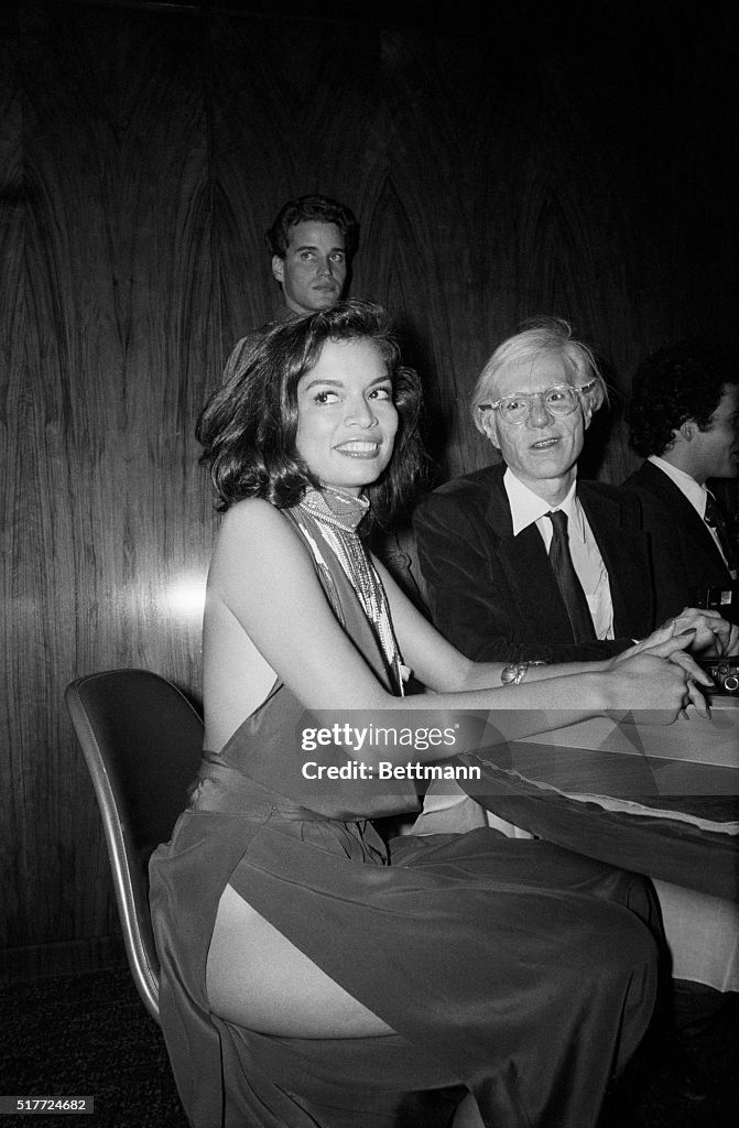 Bianca Jagger and Andy Warhol at Party