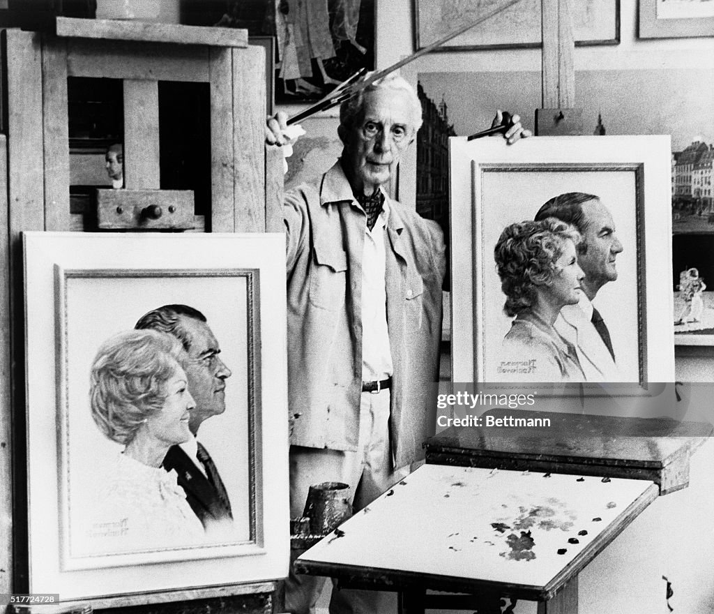 Norman Rockwell Stands Between Paintings