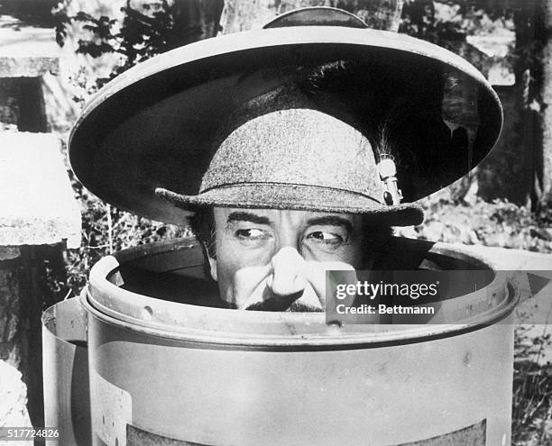 Inspector Jacques Clouseau hides in a trash can in The Pink Panther Strikes Again.