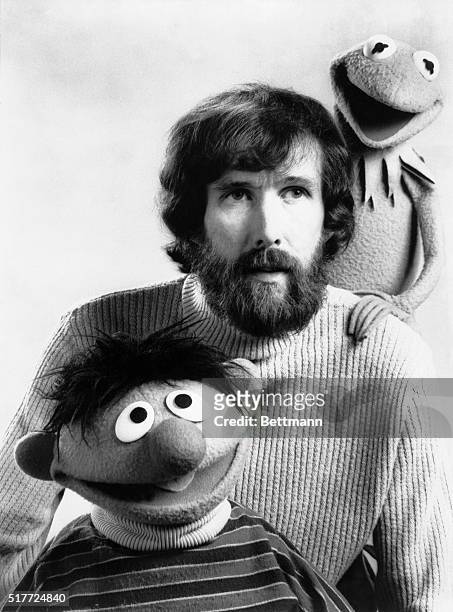 Jim Henson with two of his Muppets, 'Kermit The Frog' and 'Ernie' from 'Sesame Street', March 27th 1973.