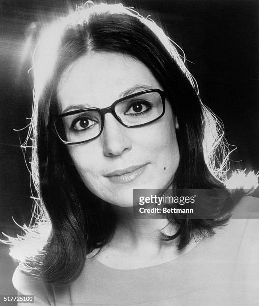 Closeup headshot of singer Nana Mouskouri. Photograph, 1977.