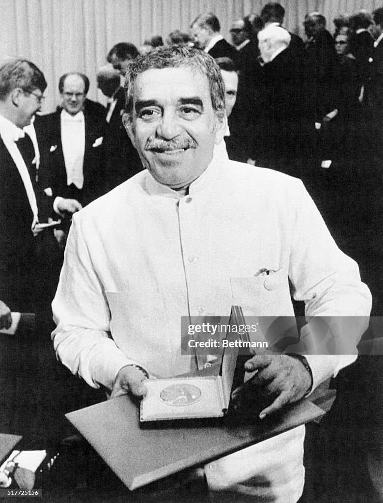 Writer Gabriel Garcia Marquez Holding Nobel Prize Medal