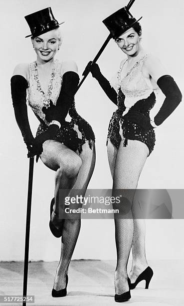 Lorelei Lee and Dorothy Shaw dance with top hats and canes in Gentlemen Prefer Blondes.