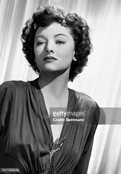 Hollywood, California: Actress Myrna Loy, the screen's "perfect wife," disclosed that she and producer Gene Markey have separated. Miss Loy said the...
