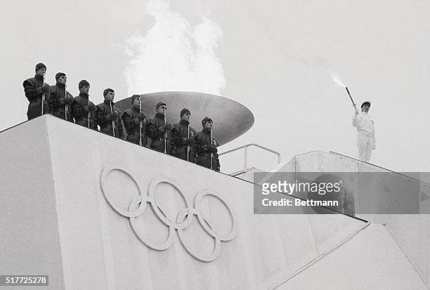 The Olympic flame burns for the Sarajevo Winter Games after Yugoslav figure skater Sanda Dubravcic lights the cauldron in the opening ceremonies.