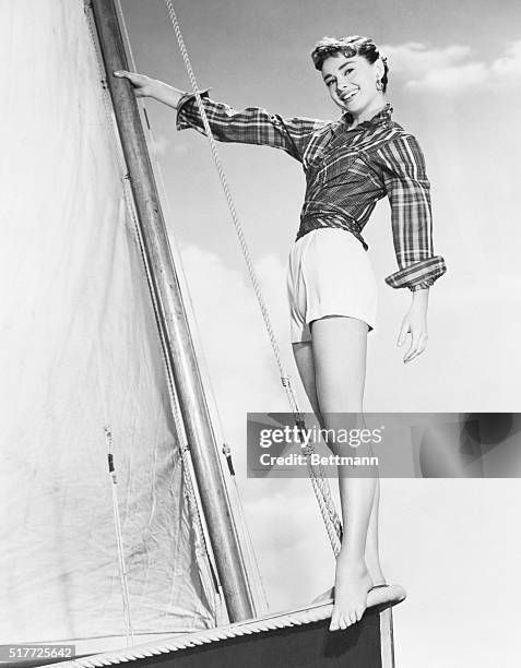 New York:Young Audrey Hepburn, whose professional star is sailing smoothly through the theatrical heavens, makes a pretty sight before the mast. The...