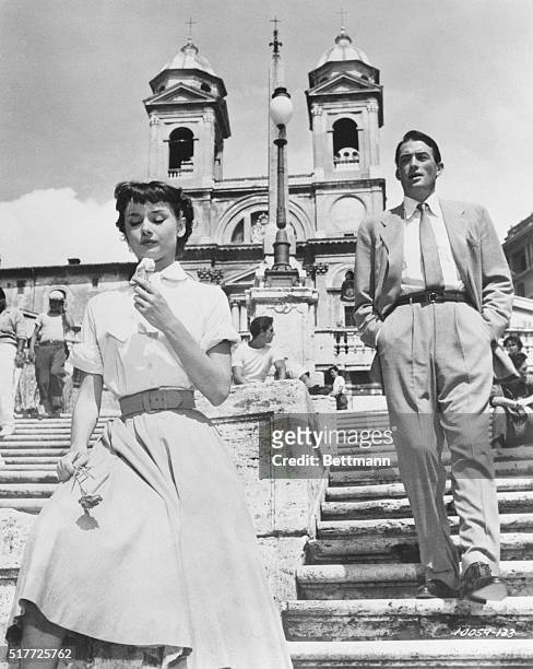 Audrey Hepburn as Princess Ann and Gregory Peck as Joe Bradley on the Spanish Steps in Roman Holiday.