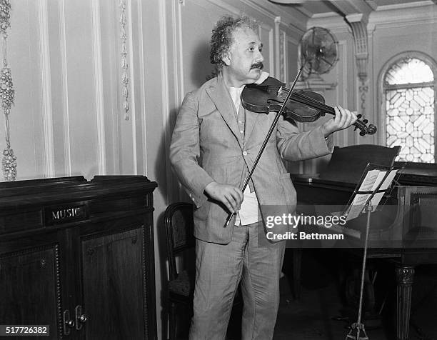 Professor Albert Einstein playing his violin. 1932.
