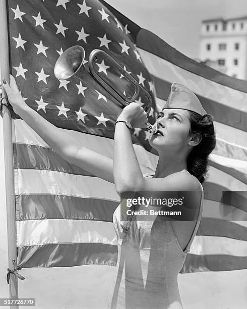 Venice, CA: Alma Carroll, wearing an Army overseas cap, has answered the beauty draft call here, where "Miss America of National Defense",...