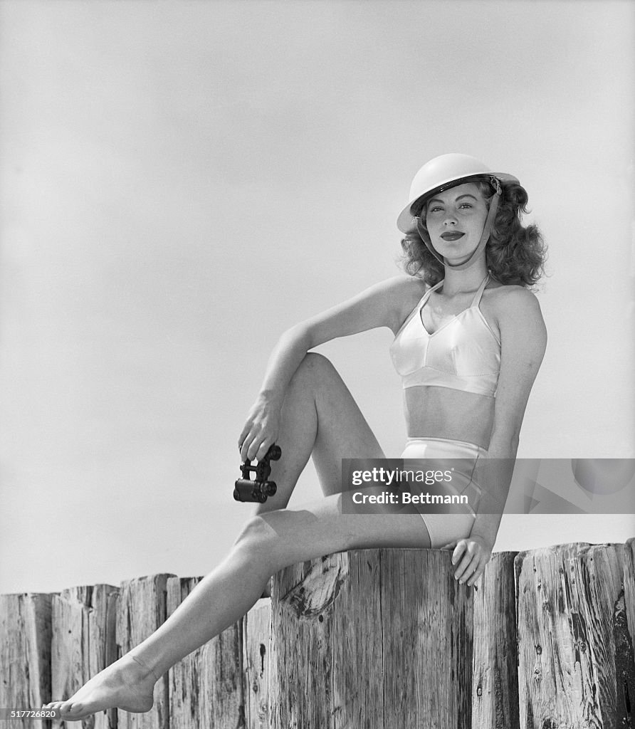 Ava Gardner in Two-Piece Swimsuit and Shore Patrol Gear