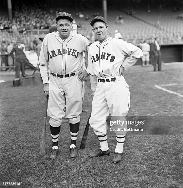 New York, NY: The one and only Babe Ruth, now with the Boston Braves, and Mel Ott, slugging outfielder of the New York Giants, snapped just before...