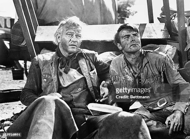 John Wayne as Thomas Dunson, and Montgomery Clift as Matt Garth in the 1948 western film Red River.