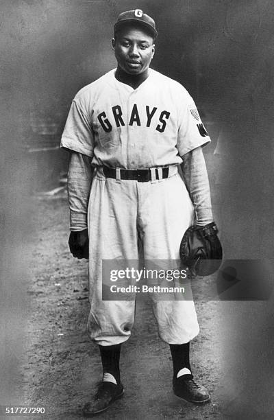 Portrait of baseball great Josh Gibson in a Homestead Grays baseball uniform. Known as the "Black Babe Ruth" for his home run prowess, Gibson played...