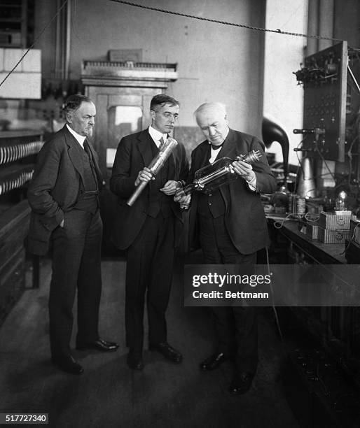 Thomas Edison and Dr. Irving Langmuir are shown here discussing the vacuum tube at the General Electric Research Laboratory. Undated photograph.