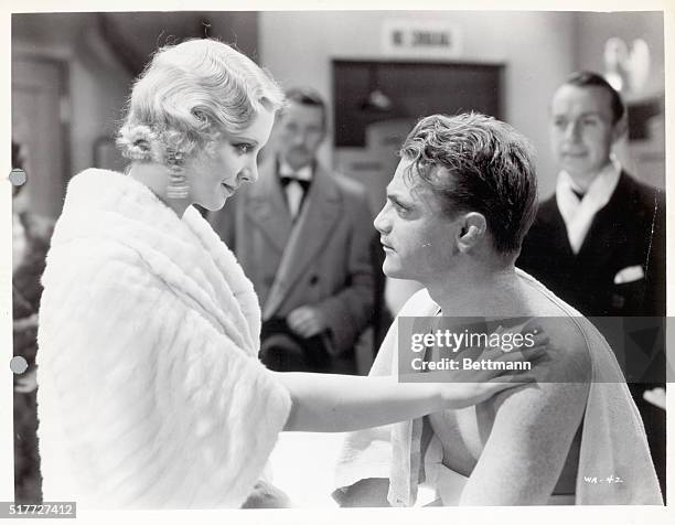 Picture shows a scene from the movie, "Winner Take All", where Virginia Bruce is shown Talking to James Cagney after a Boxing match in his dresing...