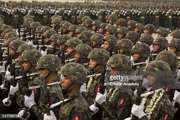 Soldiers attend a military parade as Myanmar marks the 71st Armed Forces Day in Nay Pyi Taw, on March 27, 2016 in commemoration of the beginning of...