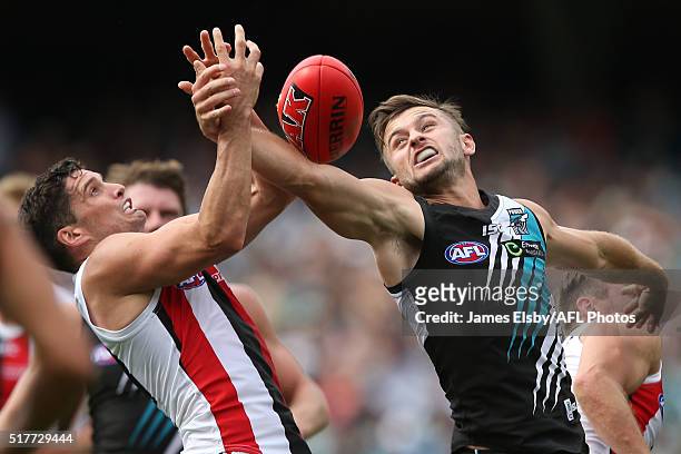 Leigh Montagna of the Saints competes with Sam Gray of the Power during the 2016 AFL Round 01 match between Port Adelaide Power and the St Kilda...