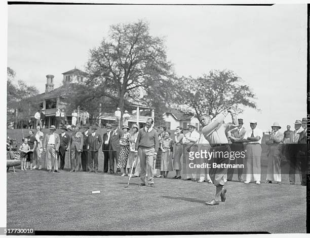 Preparing for Masters' Tourney. Augusta, Georgia: Bobby Jones driving from the first tee at the Augusta, Ga., National Golf Club where his is...