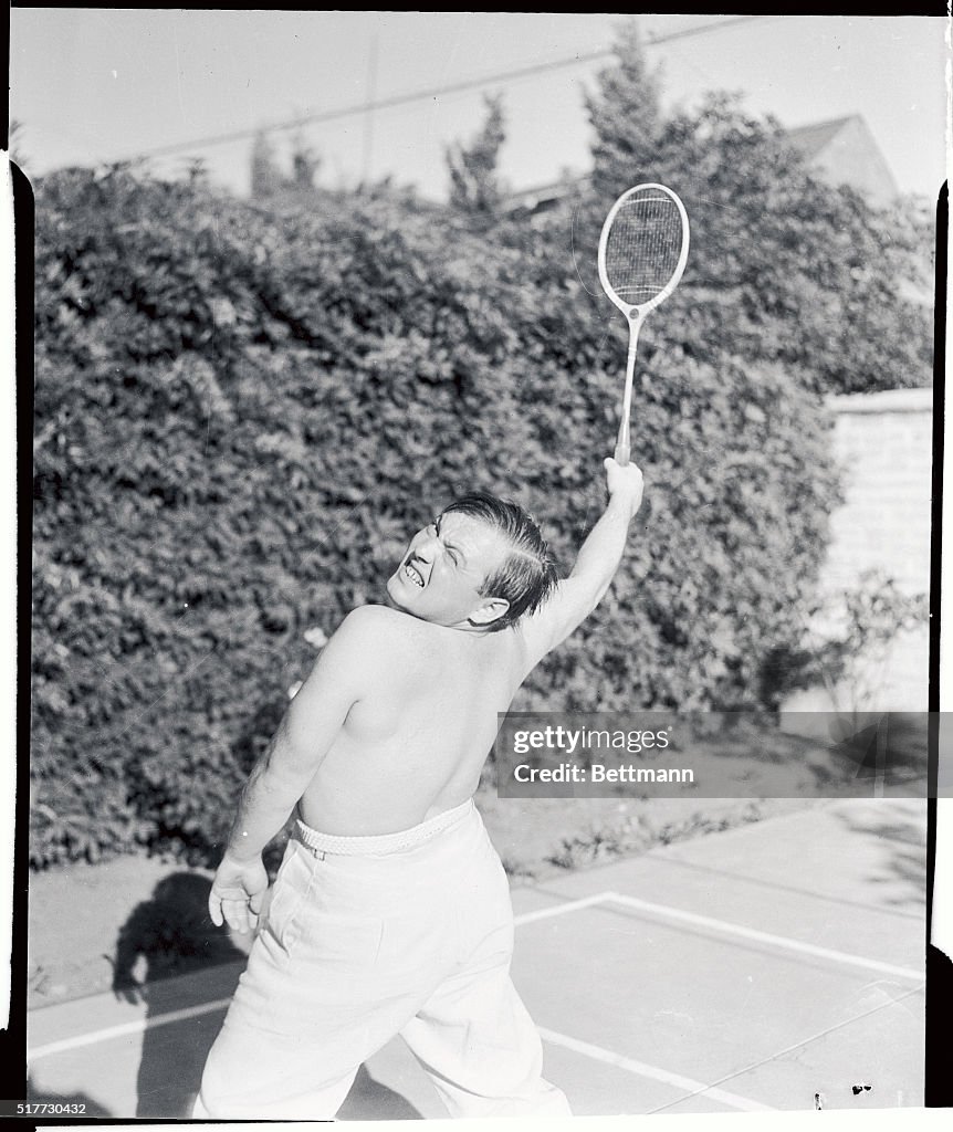 Peter Lorre Playing Badminton