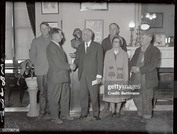 Vice President Charles Curtis receives delegation of farmers seeking relief in Congress. L to R George Keith of Idaho, Lewis C. Bentzley of...