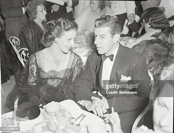 California: Beverly Wilshire Hotel. British and RAF war relief party given by Mrs. Basil Rathbone. Loretta Young and Tom Lewis attending the party.