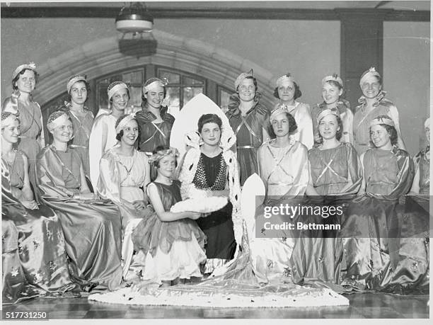 Philadelphia, Pennsylvania: Photo shows the May Queen of Temple University and her Court as they held first rehearsal for May Day pageant to be held...