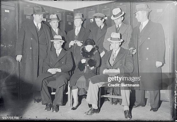 The four men and their woman companion, who were arrested on a charge of conspiring to holdup the Biltmore Theatre, in Brooklyn and held under...