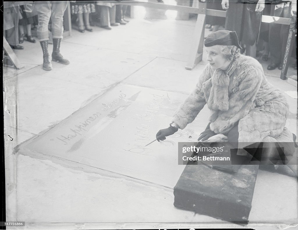 Star Inscribing Name in Cement