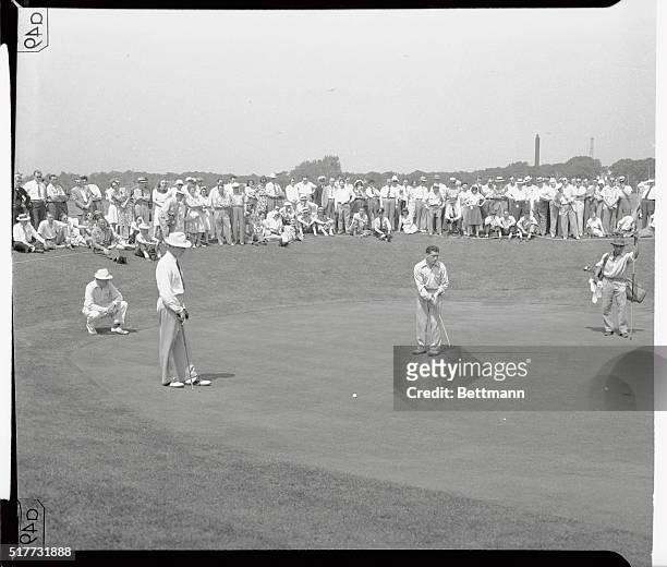 Corporal Jimmy Turnesa sinks a 15-foot putt on the 5th green in the morning round of the finals of the Silver Anniversary PGA Championship match with...