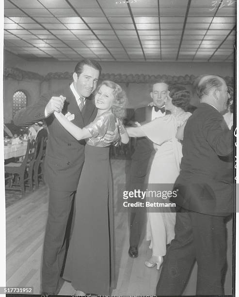 John Boles and Lillian Harvey dancing in the supper room of the Agua Caliente Jockey Club.