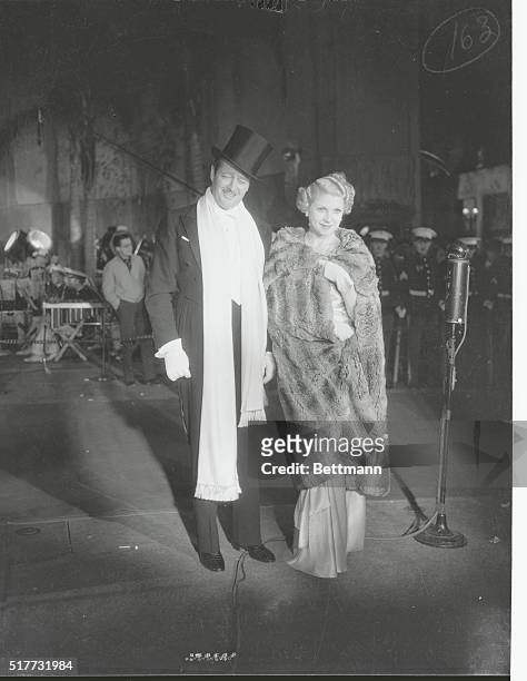 Notables at Opening of Cavalcade at Grauman's Chinese Theater, Hollywood, California. Hollywood, California: Edmund Low and Lilyan Tashman. Miss...