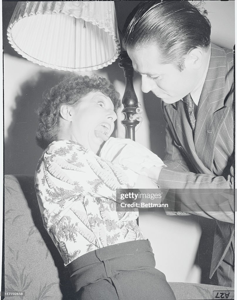 Nicky Arno Pulling Wife Elsie'sTongue for Hiccup Cure