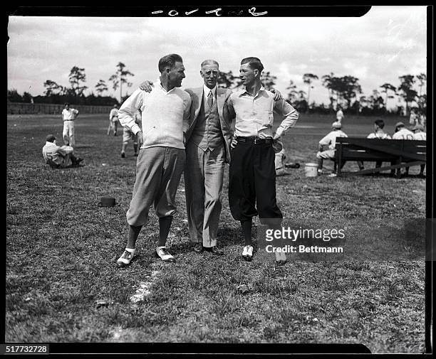 Just to show their is no hard feelings between them, no doubt, two of his former employees dropped in on Connie Mack at the athletics training camp...