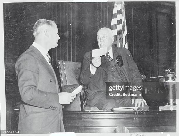 Albert S. Osborn, handwriting expert, shown as he testified at the extradition hearing of Bruno Hauptmann in Bronx Supreme Court. He is being...