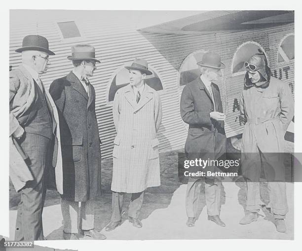 Photo shows left to right: William B. Mayo, head engineer of the Ford Motor Company; W.C. Stout, head of the Stout Metal Airplane Company; Edsel...