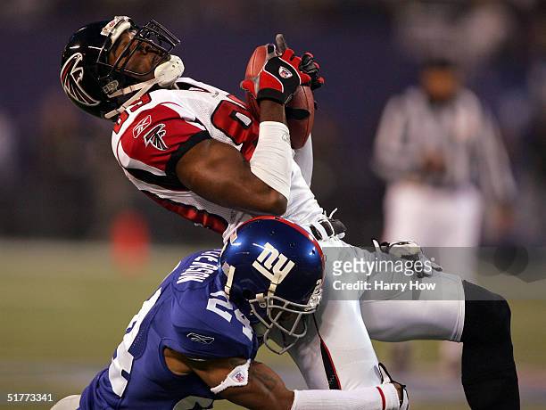 Wide receiver Dez White of the Atlanta Falcons is tackled by cornerback William Peterson of the New York Giants after a reception in the first...