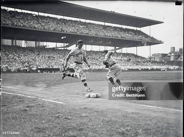 Chicago: Third baseman Joe Stripp of the Brooklyn Dodgers out at first base in the first inning of the third game of the three-game series between...