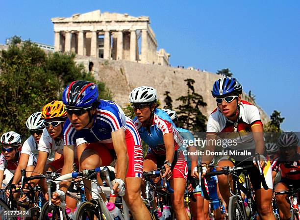 General view of the competitors in the women's cycling road race passing the Acropolis on August 15, 2004 during the Athens 2004 Summer Olympic Games...