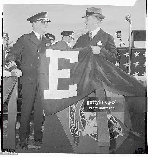 Secretary of Navy Frank Knox , addressing workers at the Washington Navy Yard, November 19th, at a ceremony at which he awarded the Navy "E" pennant...