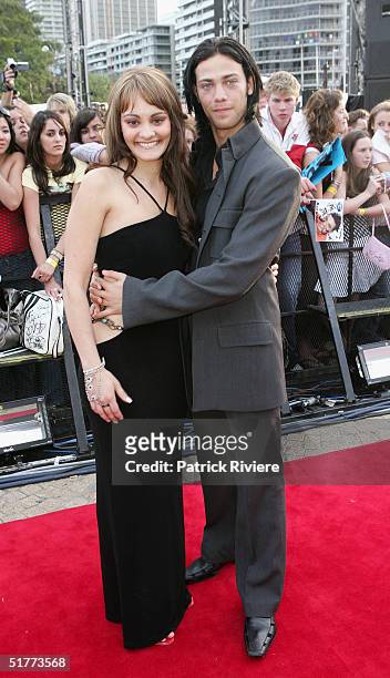Singer Cosima and dancer Michael Miziner attend the finale of the second Australian Idol on the steps of the Opera House November 22, 2004 in Sydney,...
