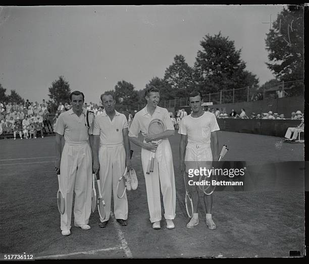 Fred Perry of England, Wilmer Allison, national singles champion, Donald Budge, and Frank A. Parker are pictured before an exhibition doubles match...