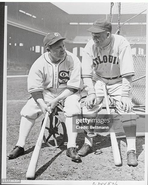 Managers Jimmy Dykes, , of the Chicago White Sox and Rogers Hornsy of the St. Louis Browns are photographed here at the start of a game between their...