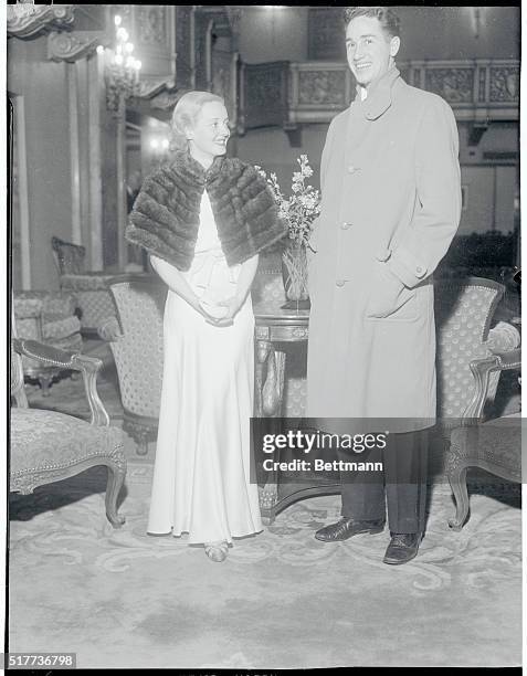 Bette Davis, screen luminary, and her husband, Harmon O. Nelson, Jr., musician, are shown as they appeared recently in the Supper Room of the Beverly...