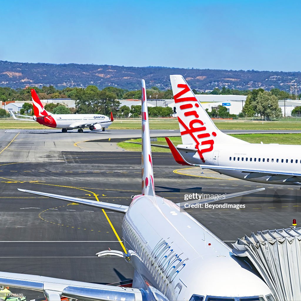 Competing airlines Qantas and Virgin at Adelaide airport