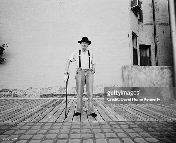 Pulitzer Prize-winning photojournalist Eddie Adams poses on his roof deck at his apartment August 20, 2004 in New York City. Adams died September 19,...