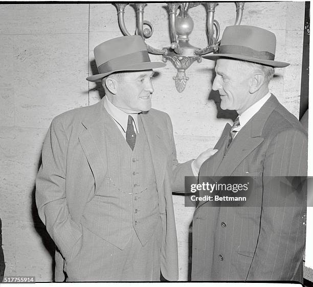 Joe McCarthy , manager of the New York Yankees, and Casey Stengel, manager of the Boston Braves, pictured on Chicago for the annual winter meeting of...